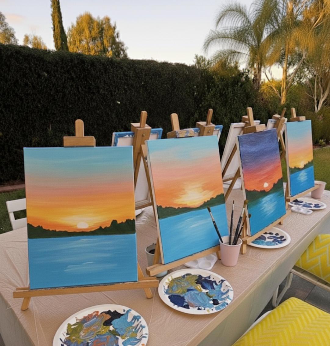 Families and friends bonding through painting at a Brush & Buzz creative workshop.